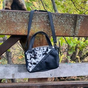 Custom cowhide and leather handbag